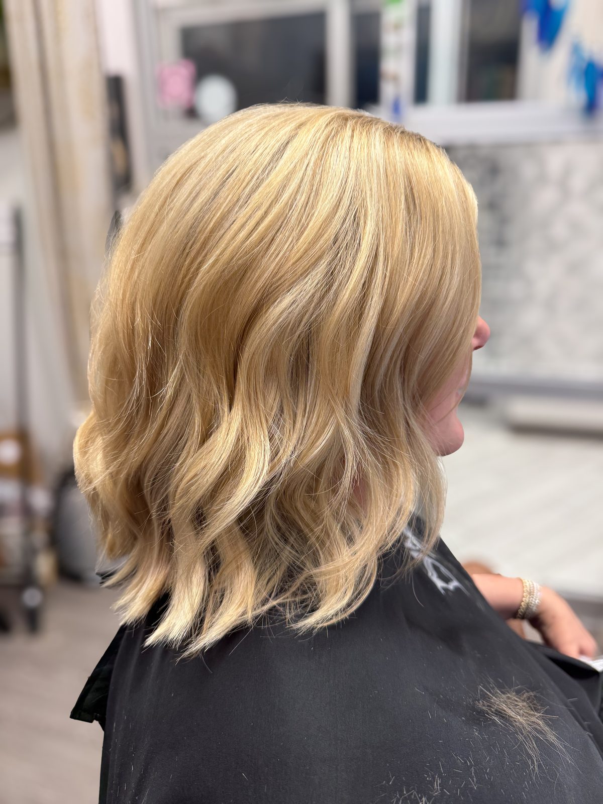 Buttery blonde lob with soft waves